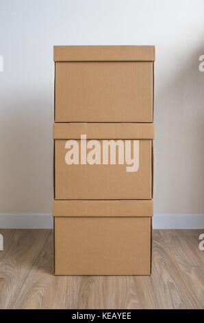 stack of cardboard boxes or carton boxes with lid Stock Photo