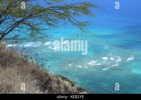 Hiking up to the summit of Diamond Head on the island of Oahu, Hawaii, offers spectacular views of the ocean below. Stock Photo