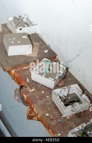 Old enectric switches in abandoned home Stock Photo