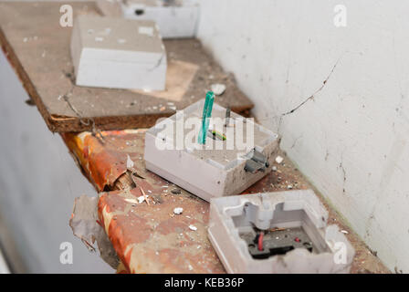 Old enectric switches in abandoned home Stock Photo