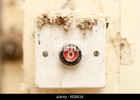 Old enectric switch in abandoned home Stock Photo