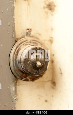 Old enectric switch in abandoned home Stock Photo
