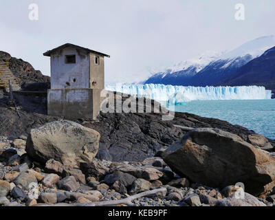 Concrete abandoned building on shore of Lago Argentino, Perito Moreno Glacier, Argentina Stock Photo