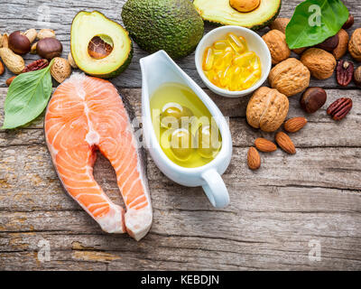 Selection food sources of omega 3 and unsaturated fats. Superfood high vitamin e and dietary fiber for healthy food. Almond,pecan,hazelnuts,walnuts,ol Stock Photo