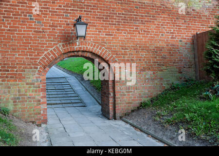 Old birck wall - entry to Cathedral in Frombork, Poland. Stock Photo