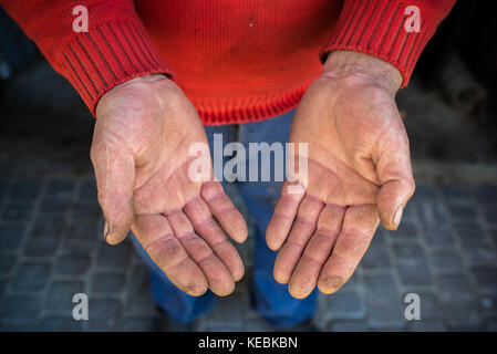 Hard work concept, hands closely, traces of work Stock Photo