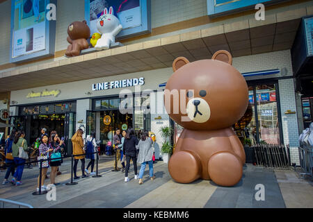 SHENZEN, CHINA - 29 JANUARY, 2017: Entrance to pastry shop with beautiful display of cakes and cookies in animal shapes Stock Photo