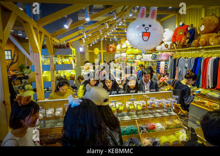 SHENZEN, CHINA - 29 JANUARY, 2017: Inside pastry shop with beautiful display of cakes and cookies in animal shapes Stock Photo