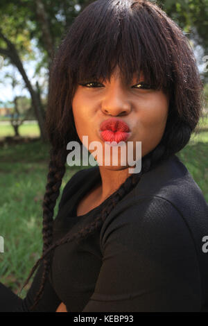 Young Lady in black dress Stock Photo