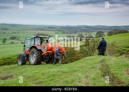 Chipping, UK. 19th Oct, 2017. Work taking place to install the World’s fastest rural broadband in the farmland around Chipping, Preston, Lancashire. Offering a full 1,000Mbps, B4RN, Broadband for the Rural North, is a professionally designed fibre optic broadband network, registered as a non-profit community benefit society, and run with the support of landowners and volunteers. Credit: John Eveson/Alamy Live News Stock Photo