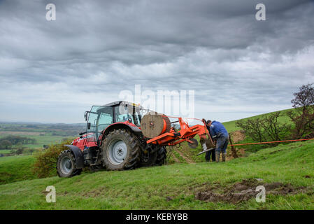 Chipping, UK. 19th Oct, 2017. Work taking place to install the World’s fastest rural broadband in the farmland around Chipping, Preston, Lancashire. Offering a full 1,000Mbps, B4RN, Broadband for the Rural North, is a professionally designed fibre optic broadband network, registered as a non-profit community benefit society, and run with the support of landowners and volunteers. Credit: John Eveson/Alamy Live News Stock Photo