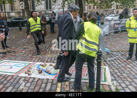 London, UK. 19th Oct, 2017. A picket outside the BHP global mining giant's AGM in Westminster includes community representatives from Arizona, USA, Cerrejon, Colombia and Minas Gerais, Brazil opposed to BHP's mining activities which are causing social and environmental destruction in their areas. Credit: ZUMA Press, Inc./Alamy Live News Stock Photo