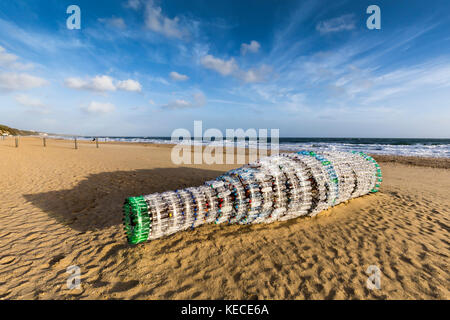 ‘Message in a Bottle’ is an 8-meter long  bottle made from plastic bottles washed up on the beach. It is part of Bournemouth Arts Festival