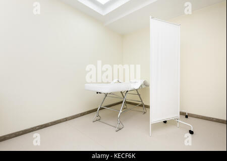 Massage room with empty table Stock Photo