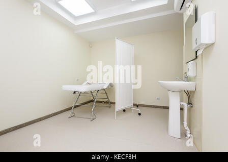 Massage room with empty table Stock Photo