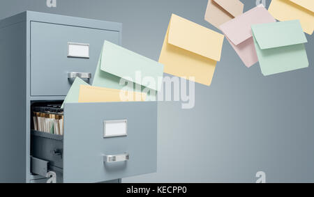 Fast files transfer into a filing cabinet: data storage, backup and archive concept Stock Photo
