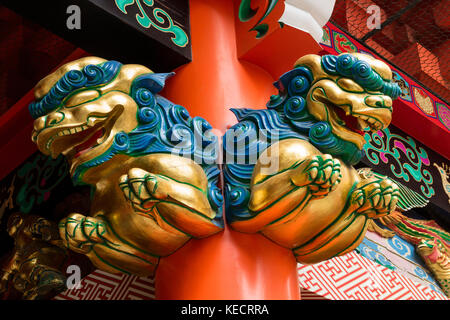 Tokyo, Japan - May 14, 2017:  Colorful wooden guardian lions as a decoration to guard the sacred temple Stock Photo