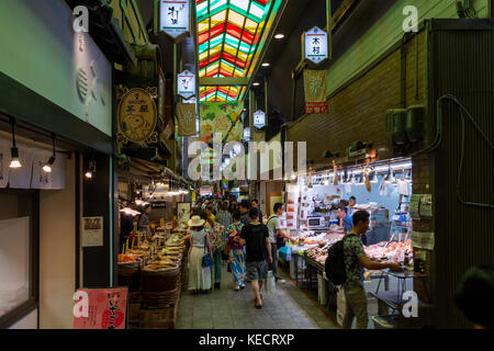 Kyoto, Japan -  May 22, 2017:  Shopping at the Nishiki market, Kyoto, for fish and fermented vegetables Stock Photo