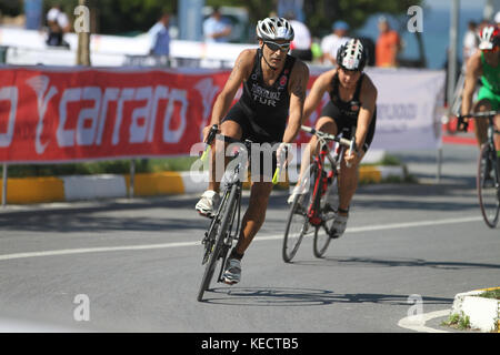 ISTANBUL, TURKEY - JULY 29, 2017: Athletes competing in cycling component of Istanbul Beylikduzu ETU Triathlon European Cup. Stock Photo