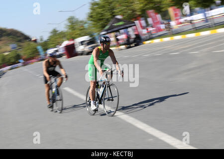 ISTANBUL, TURKEY - JULY 29, 2017: Athletes competing in cycling component of Istanbul Beylikduzu ETU Triathlon European Cup. Stock Photo