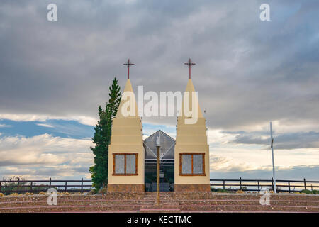 Heavy clouds over roadside church near Lago Buenos Aires aka Lago General Carrera near town of Los Antiguos, Patagonia, Argentina Stock Photo