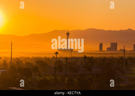 Las Vegas, Nevada, USA - October 10, 2017:  Hazy morning sunrise view towards Stratosphere tower on the Las Vegas strip. Stock Photo