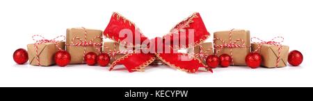 Christmas border with rustic brown and white gift boxes and red bow isolated on a white background Stock Photo