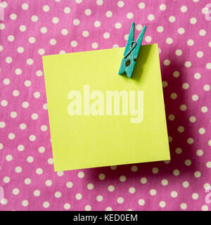 Reminder sticky notes on dot pattern fabric background Stock Photo