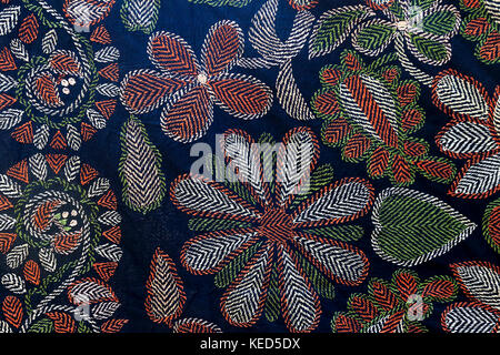 Nakskhi kantha, the embroidered quilt, treated as a piece of folk artistry for its rare beauty, colour and design. Jessore, Bangladesh. Stock Photo