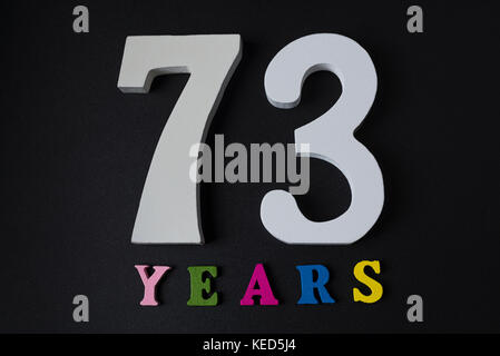 Red number 73 with reflection on a white background Stock Photo - Alamy