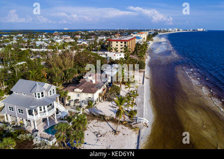 Fort Ft. Myers Beach Florida,Estero Barrier Island,Gulf of Mexico,aerial overhead view,sand,water,residential apartment buildings,residences,house hom Stock Photo