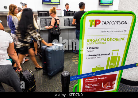 Hr Dwelling Store Florida,FL South,Miami,MIA,Miami International Airport,terminal,TAP Air  Portugal,airline carrier,ticket counter,passenger passengers rider  riders,lugg Stock Photo - Alamy