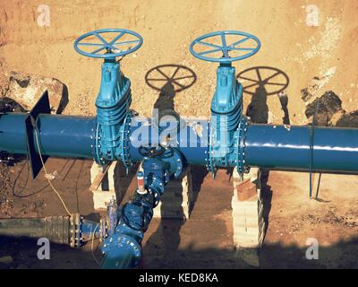 500 mm drink water Gate valve joint with screwed pipe fitting - repairing of main water pipeline underground Stock Photo