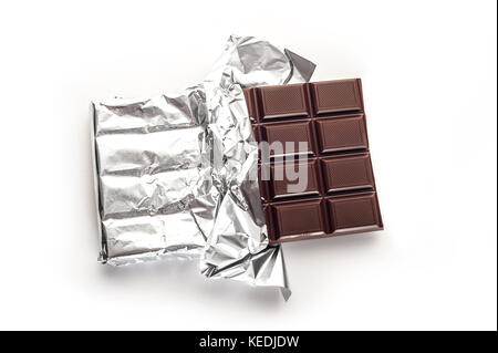 Chocolate bar in wrapper isolated on white background Stock Photo