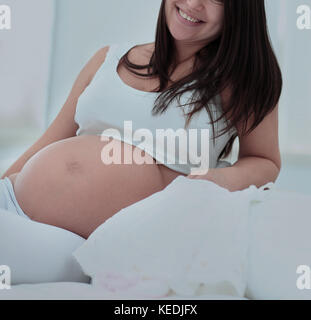 Pregnant woman smiling Stock Photo