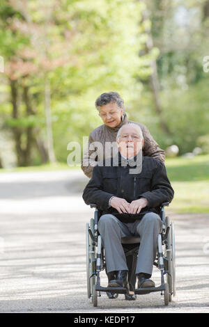 senior couple in wheelchair Stock Photo