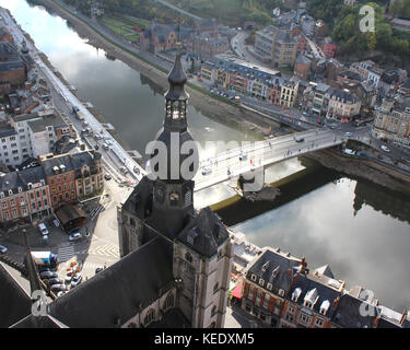 DINANT, BELGIUM, OCTOBER 13 2017: View from the citadel down to the Meuse River and Our Ladys Church in Dinant, Namur.