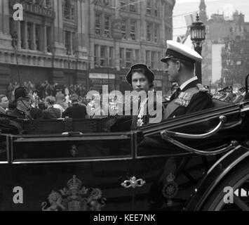 A stunning candid moment captured of Princess Elizabeth - latterly Queen Elizabeth II with Prince Philip - The Duke of Edinburgh riding in an open topped horse drawn carriage c1948  Photograph by Tony Henshaw      From the original glass negative From the wholly-owned original negative. Stock Photo