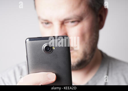 man taking selfie photo with smartphone Stock Photo