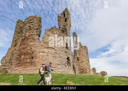 Dunstanburgh Castle on the Northumbrian coast, England, UK Stock Photo