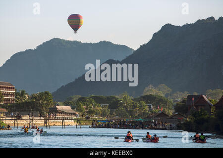 Vang Vieng, Laos - January 19, 2017: Hot air baloon in sky in Vang Vieng, Laos. Stock Photo