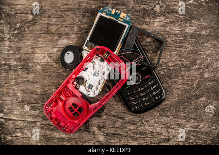 Quito, Ecuador, July 10, 2017: Close up of first generation mobile cellphone on wooden background Stock Photo