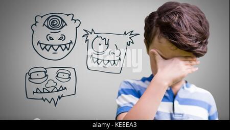 Digital composite of Upset Boy against grey background and monster faces Stock Photo