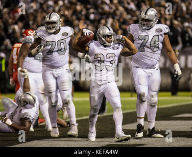 Oct 19 2017 - Oakland CA, U.S.A Raiders running back DeAndre Washington (33) celebrate his touchdown with teammates during the NFL football game between Kansas City Chiefs and the Oakland Raiders 31-30 win at O.co Coliseum Stadium Oakland Calif. Thurman James/CSM Stock Photo