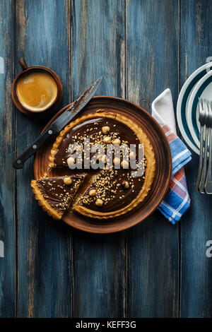 Italian walnut cake crostata with chocolate and hazelnuts. and coffee Stock Photo