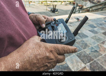 man holding drone remote control. Stock Photo