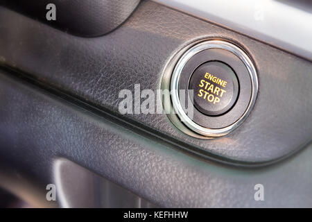 Engine start stop button of a car Stock Photo