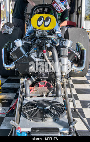 Frontal close-up view of engine and propeller of single-engined light ...