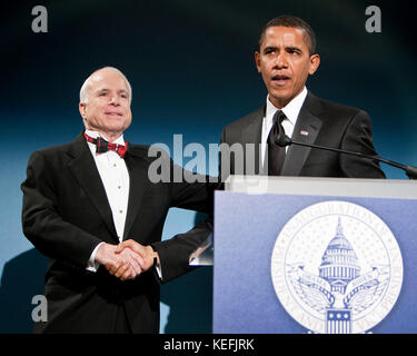 Washington, DC - January 19, 2009 -- United States President-elect Barack Obama greets United States Senator John McCain (Republican of Arizona), the Republican presidential nominee, at a bi-partisan dinner honoring McCain in Washington, D.C., U.S., Monday, January 19, 2009.   .Credit: Joshua Roberts - Pool via CNP /MediaPunch Stock Photo