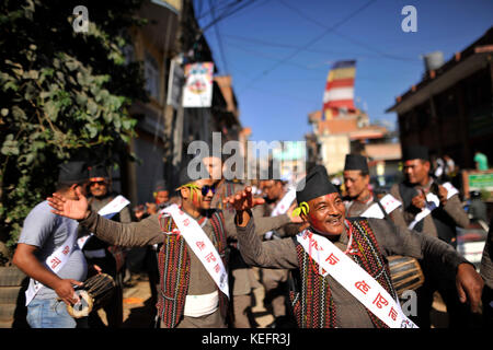 Newari People dance in a traditional instruments during Newari New Year parade Nhu Dan (the Newari New Year) falls during Tihar or Deepawali and Dewali “Festival of Lights” at Kirtipur, Kathmandu, Nepal on Friday, October 20, 2017. Newar community in Nepal observes Newari New Year 1138. Stock Photo